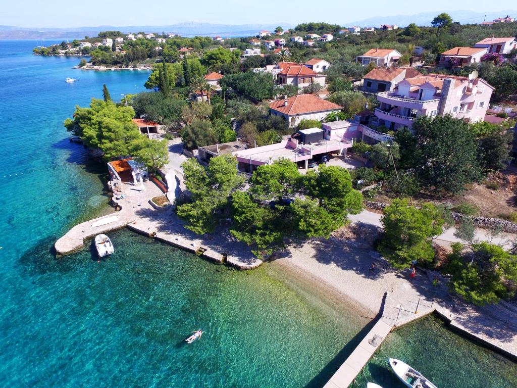 an aerial view of a house on a island in the water at Villa Paris in Nečujam