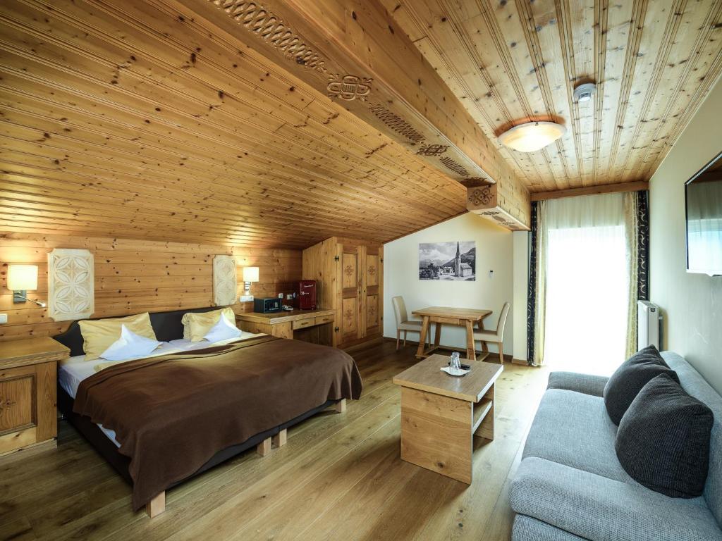 Postel nebo postele na pokoji v ubytování Hotel Victoria