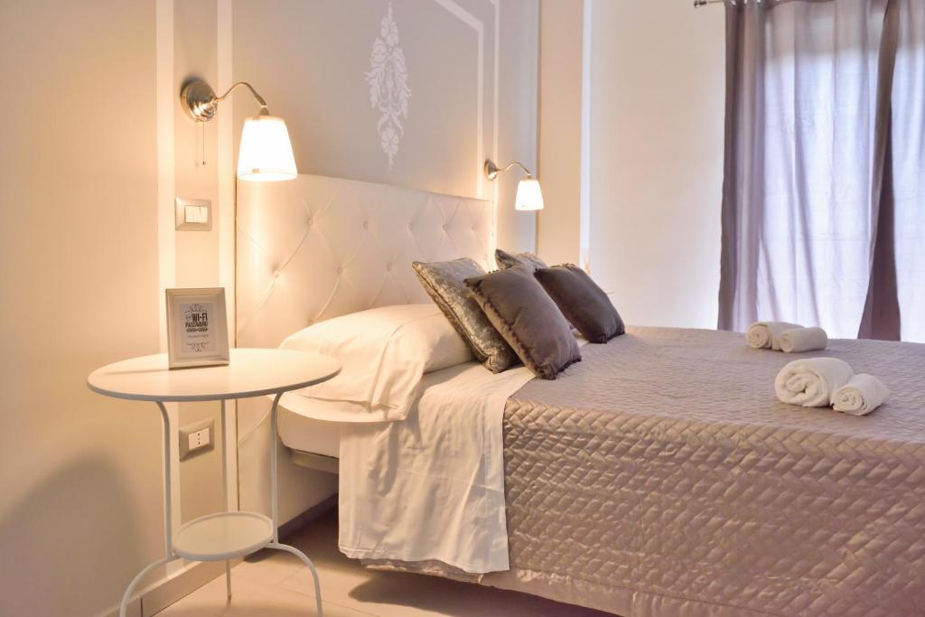 Postel nebo postele na pokoji v ubytování Insula House