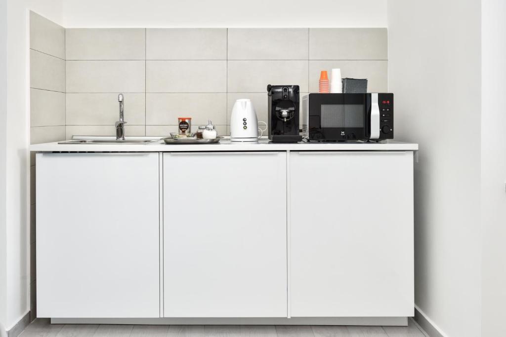 Kuchyň nebo kuchyňský kout v ubytování Insula House