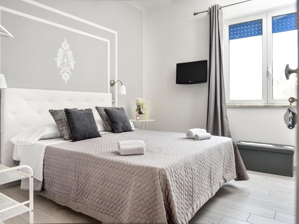 Postel nebo postele na pokoji v ubytování Insula House
