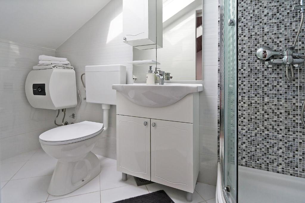 Kúpeľňa v ubytovaní Apartments Skako