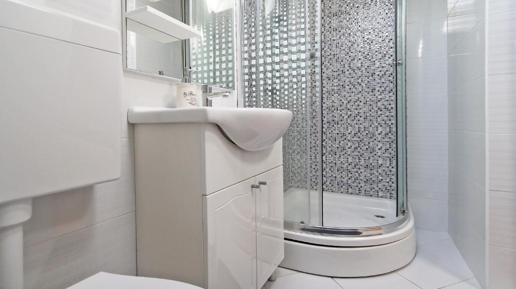 Kúpeľňa v ubytovaní Apartments Skako