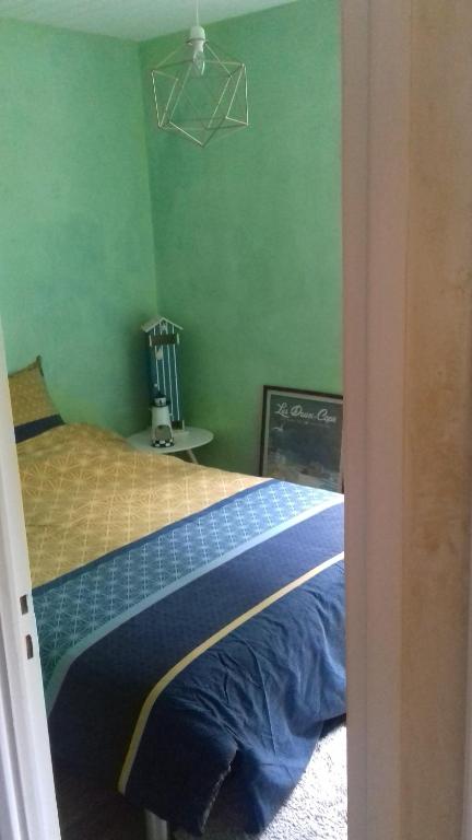 Postel nebo postele na pokoji v ubytování A l'abri des flots