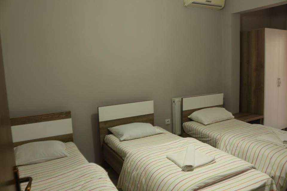 Postel nebo postele na pokoji v ubytování Old Street Guesthouse