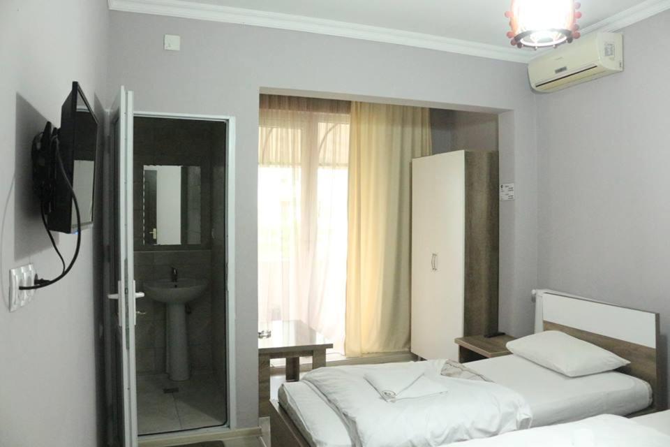 Postel nebo postele na pokoji v ubytování Old Street Guesthouse