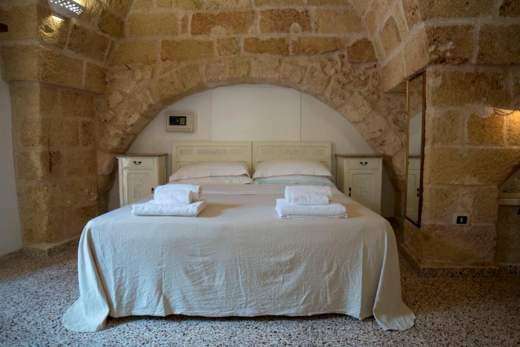 Postel nebo postele na pokoji v ubytování B&B La vecchia Corte