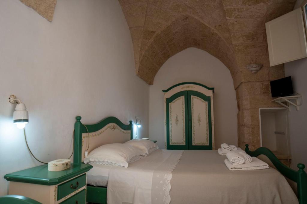 Postel nebo postele na pokoji v ubytování B&B La vecchia Corte