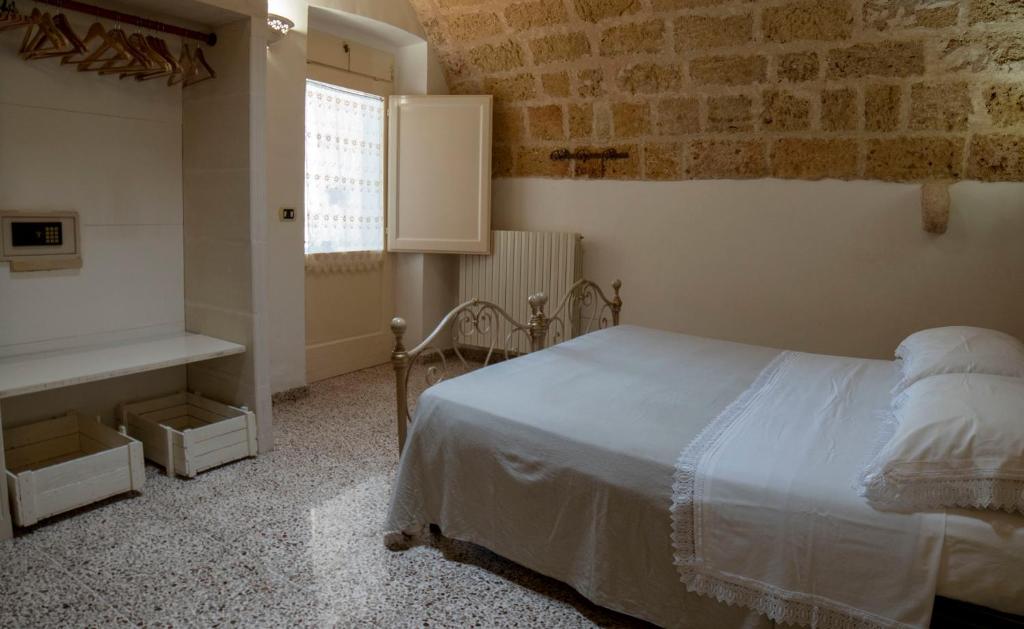 Postel nebo postele na pokoji v ubytování B&B La vecchia Corte