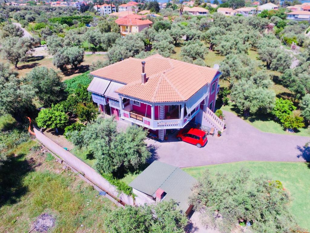 an overhead view of a large house with a red truck at Elichrison Studios in Lygia