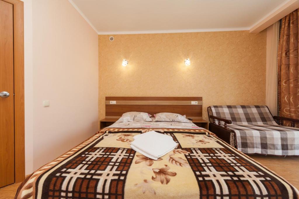 Postel nebo postele na pokoji v ubytování Villa Orchidea