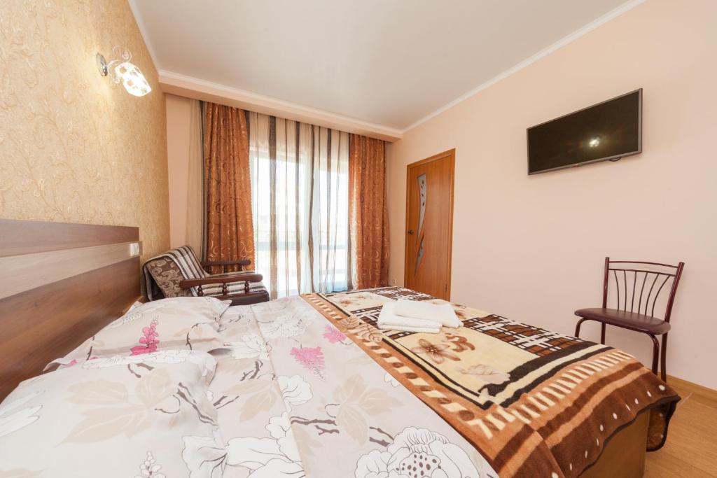 Postel nebo postele na pokoji v ubytování Villa Orchidea