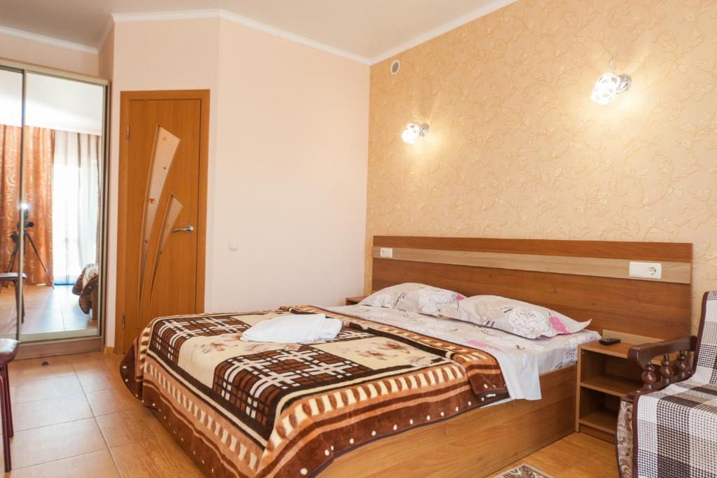 Postel nebo postele na pokoji v ubytování Villa Orchidea