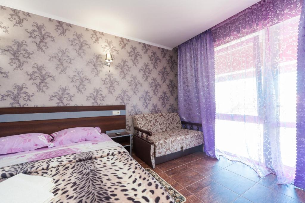 Postel nebo postele na pokoji v ubytování Villa Orchidea