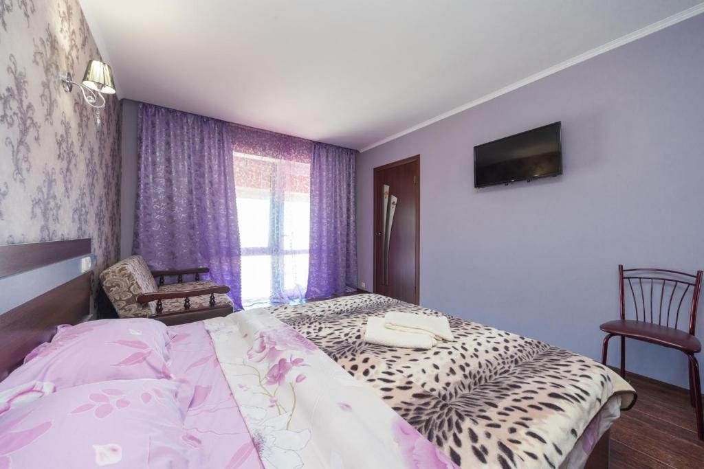 Postel nebo postele na pokoji v ubytování Villa Orchidea