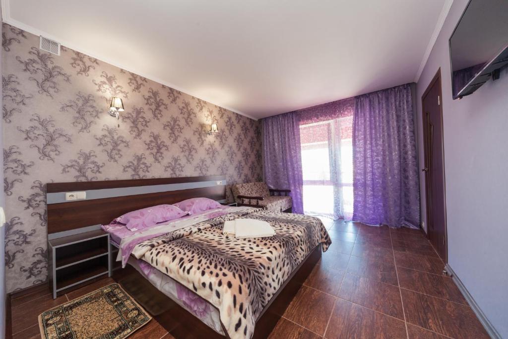 Postel nebo postele na pokoji v ubytování Villa Orchidea