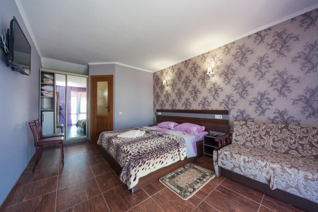 Postel nebo postele na pokoji v ubytování Villa Orchidea