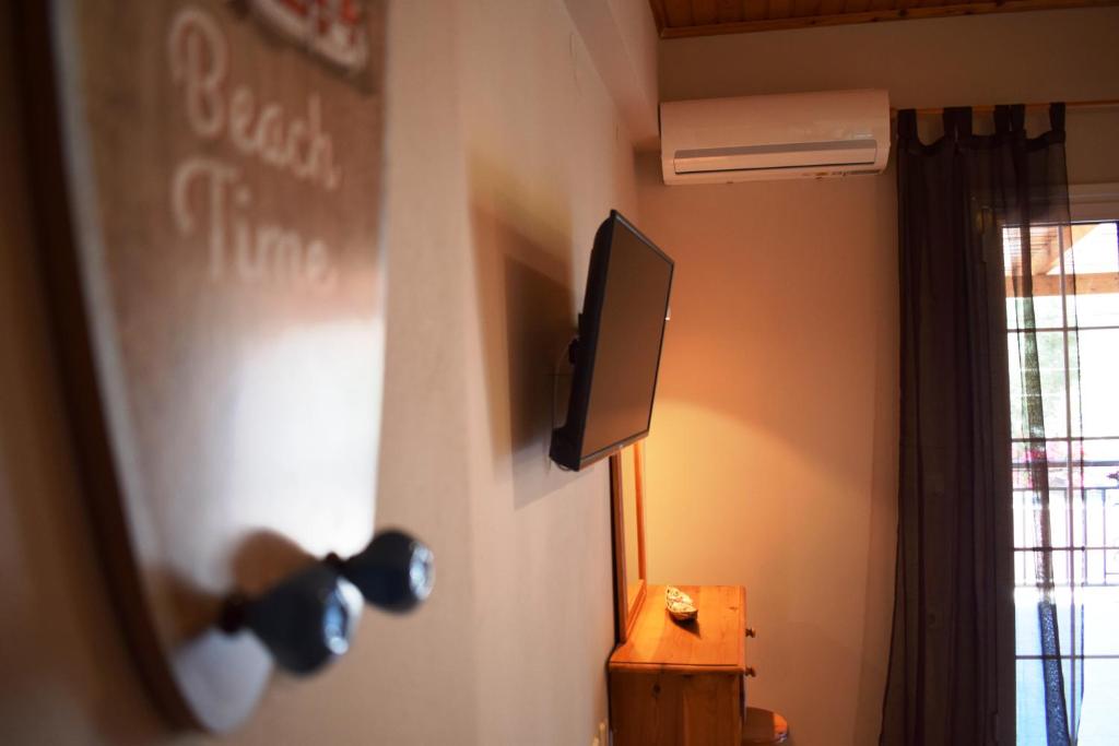 TV a/nebo společenská místnost v ubytování BelMare Studios