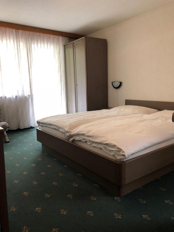 Postel nebo postele na pokoji v ubytování St Martin Apartments