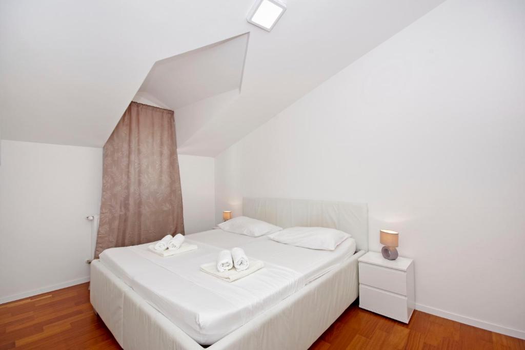 Posteľ alebo postele v izbe v ubytovaní Luxury penthouse Eva