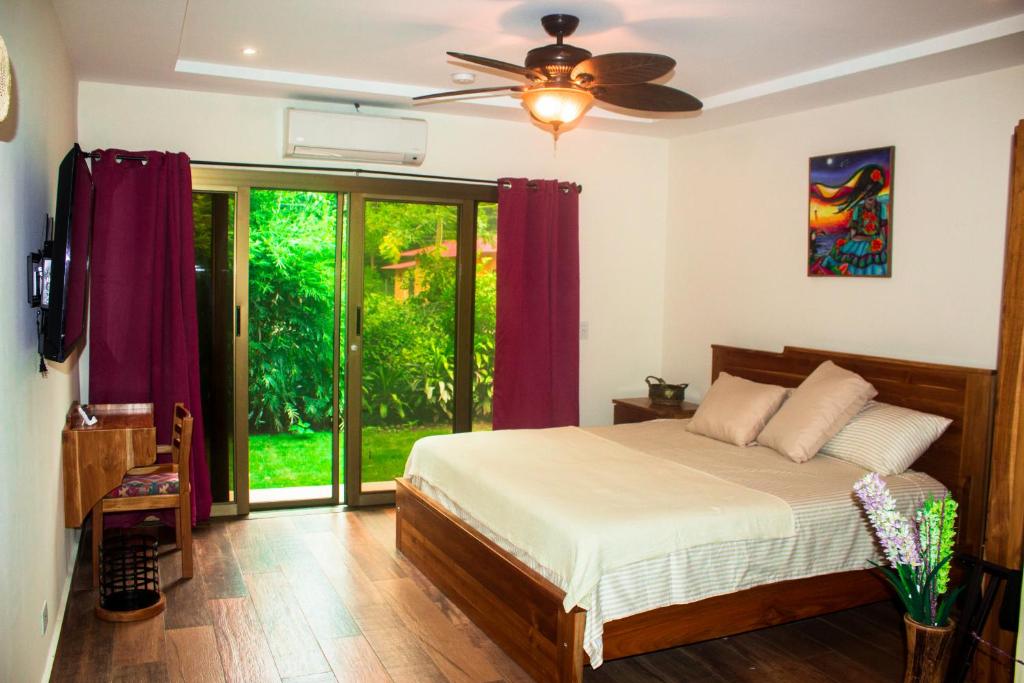 Postel nebo postele na pokoji v ubytování Hotel-Boutique Patampa