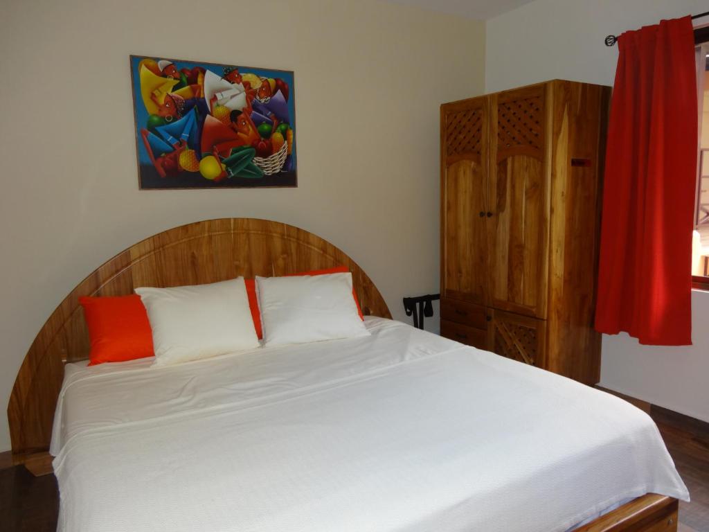 Postel nebo postele na pokoji v ubytování Hotel-Boutique Patampa