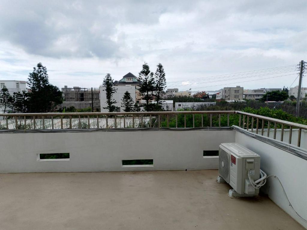 Balkón nebo terasa v ubytování Yahweh Homestay