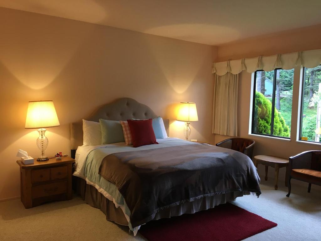 Postel nebo postele na pokoji v ubytování Arky's B&B