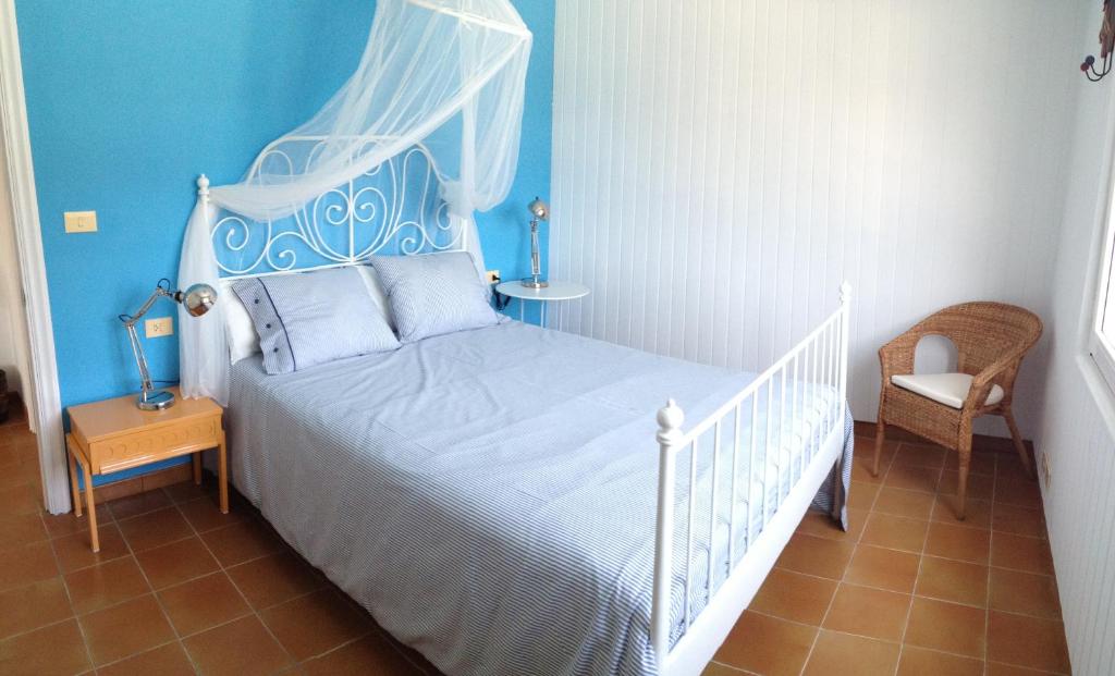 Postel nebo postele na pokoji v ubytování Esteiro Surf Lodge