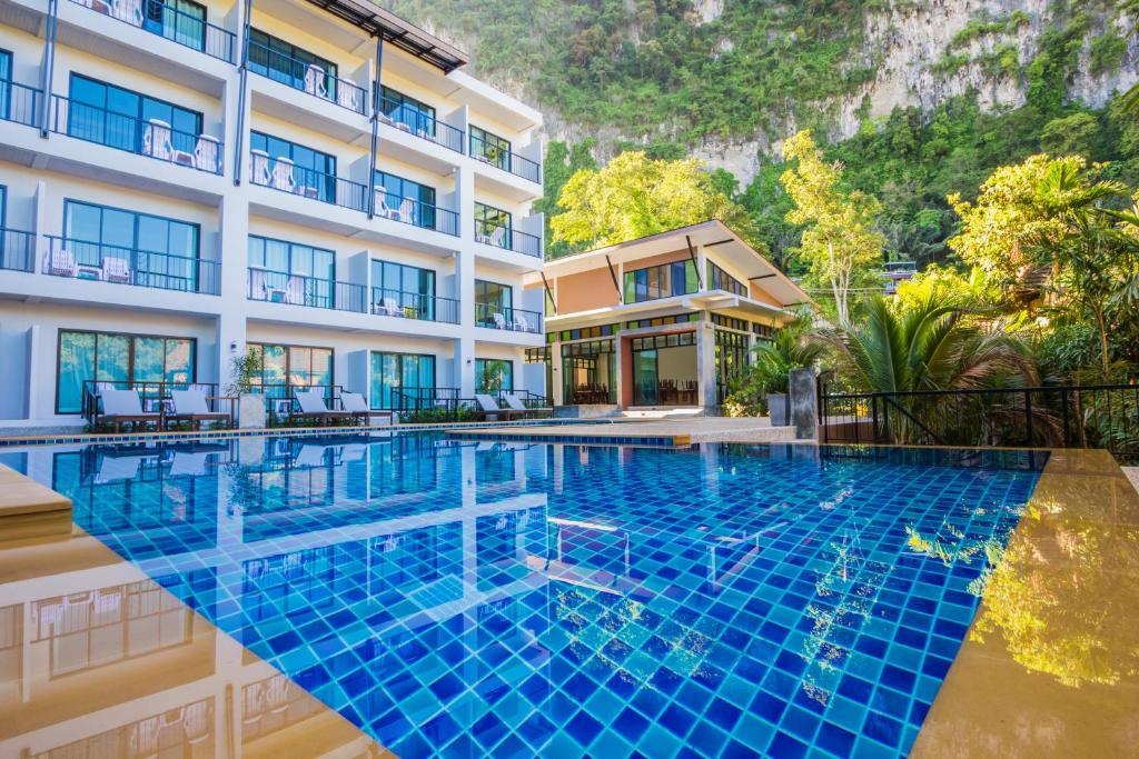 an image of a hotel with a swimming pool at Andaman Pearl Resort in Ao Nang Beach
