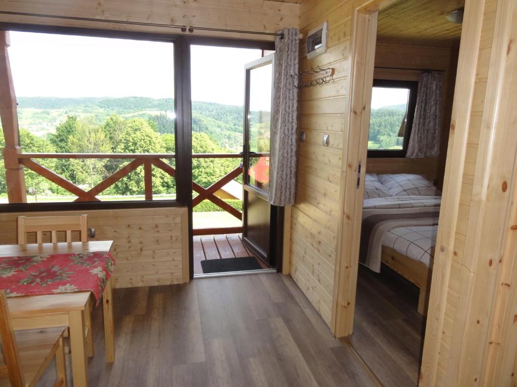 Postel nebo postele na pokoji v ubytování Wilkowka