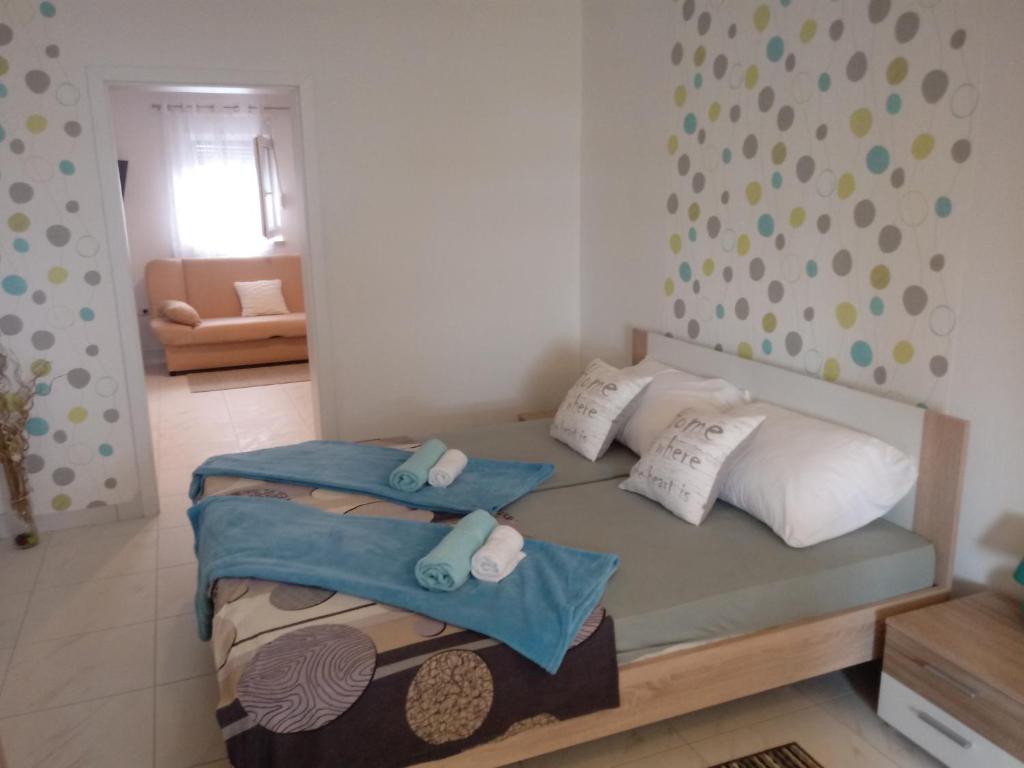 Posteľ alebo postele v izbe v ubytovaní Apartmani Fran Vir