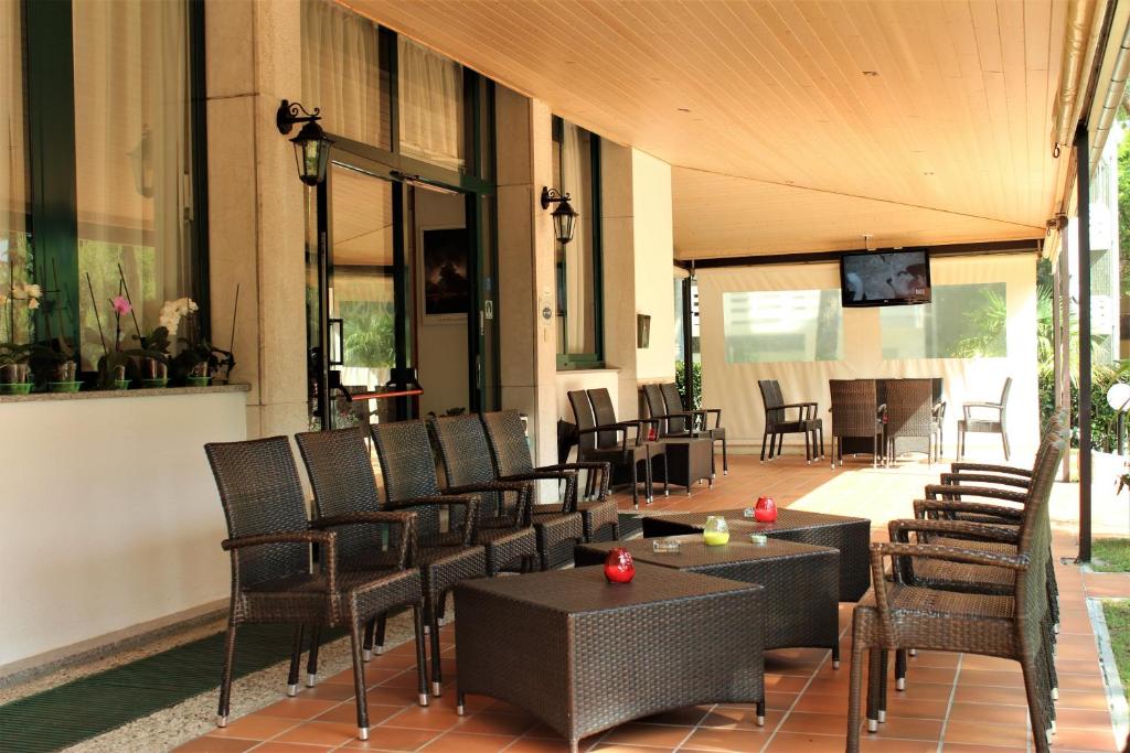 TV a/nebo společenská místnost v ubytování Hotel Eden