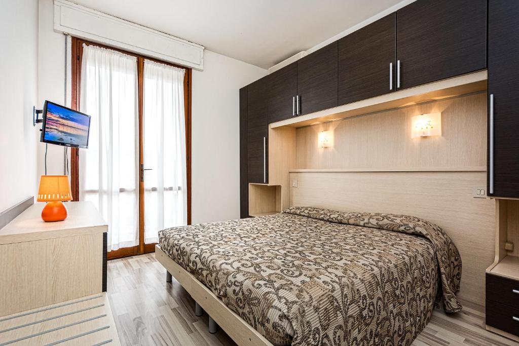 Postel nebo postele na pokoji v ubytování Hotel Eden