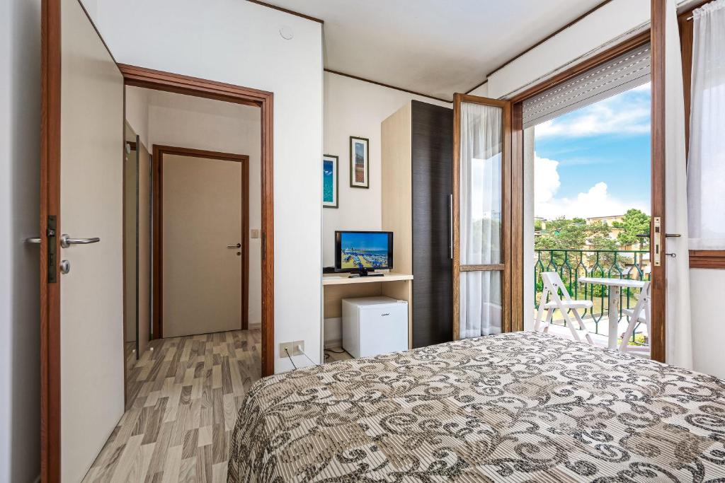 Postel nebo postele na pokoji v ubytování Hotel Eden