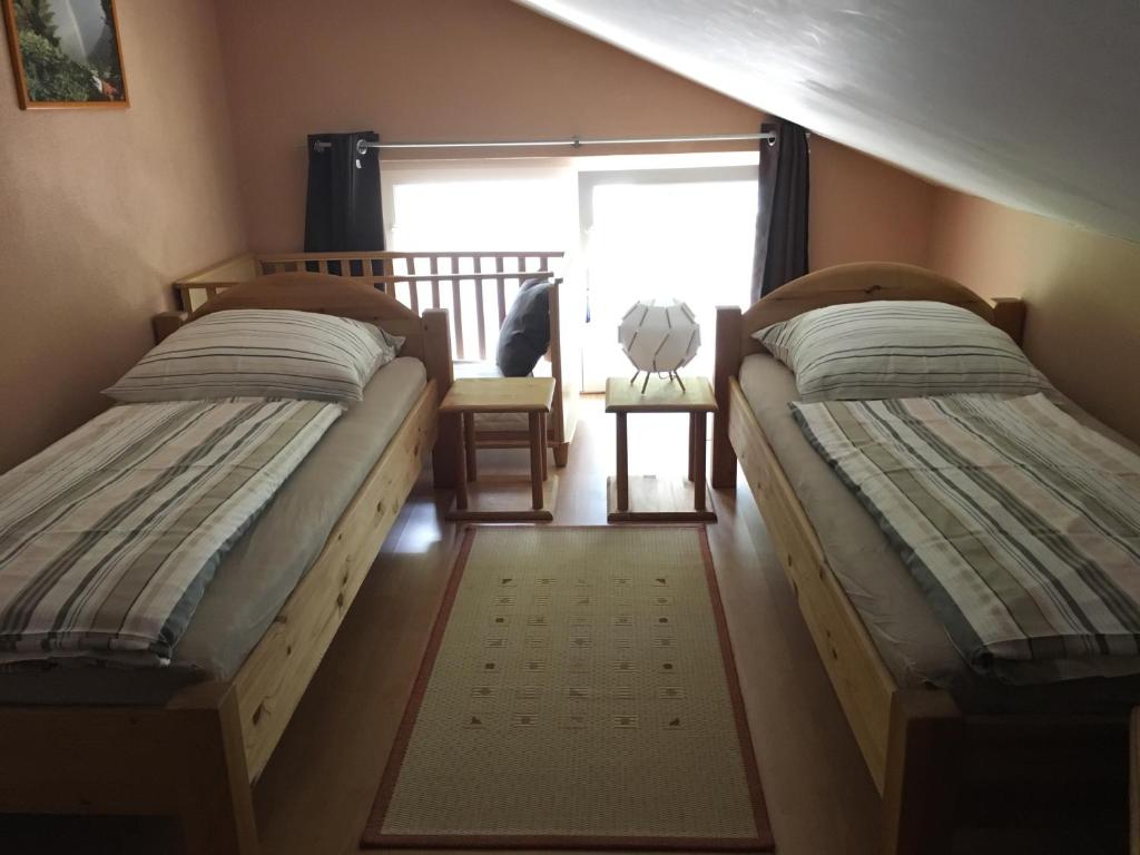 Posteľ alebo postele v izbe v ubytovaní Seegarten Appartements