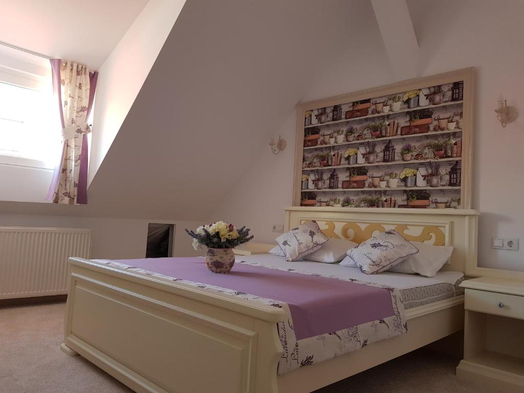 Postel nebo postele na pokoji v ubytování Vila Bohemia