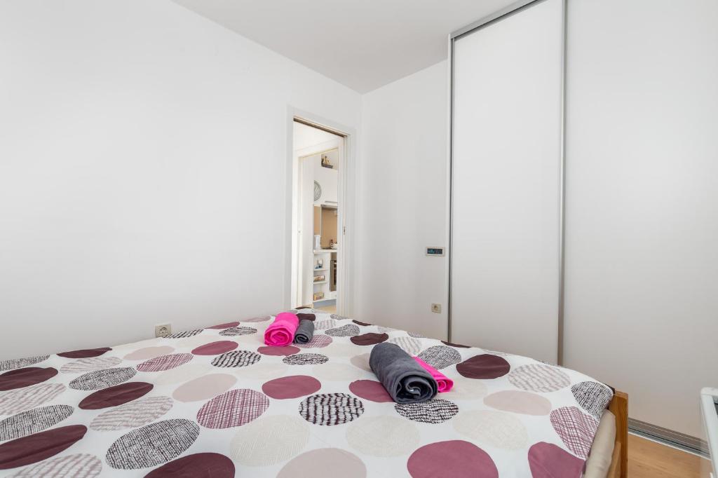 En eller flere senge i et v&aelig;relse p&aring; Smart 4 Sports Apartment