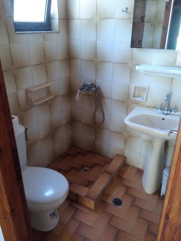 Koupelna v ubytování Hotel Dougas