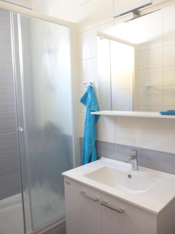 Łazienka w obiekcie Apartments Spada