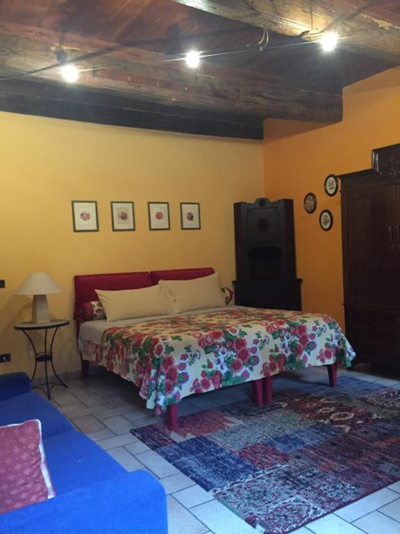 Postel nebo postele na pokoji v ubytování Cascina Baresane