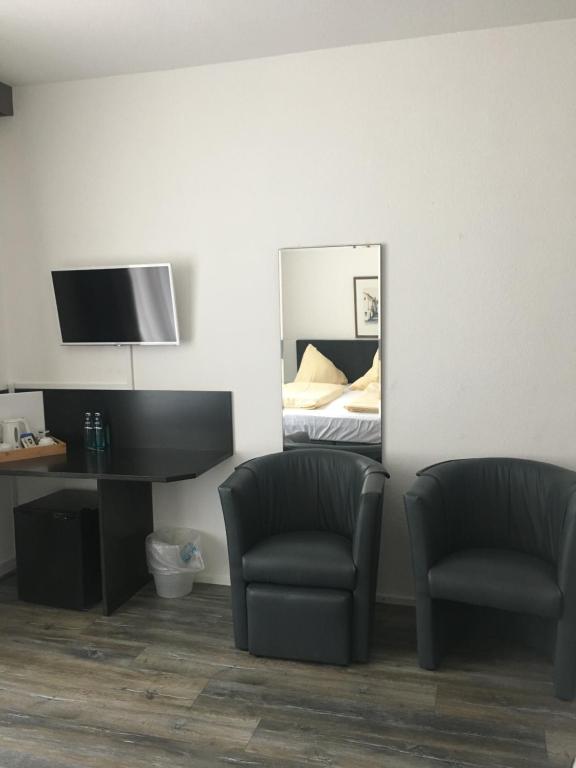TV a/nebo společenská místnost v ubytování Hotel Scheffelhof