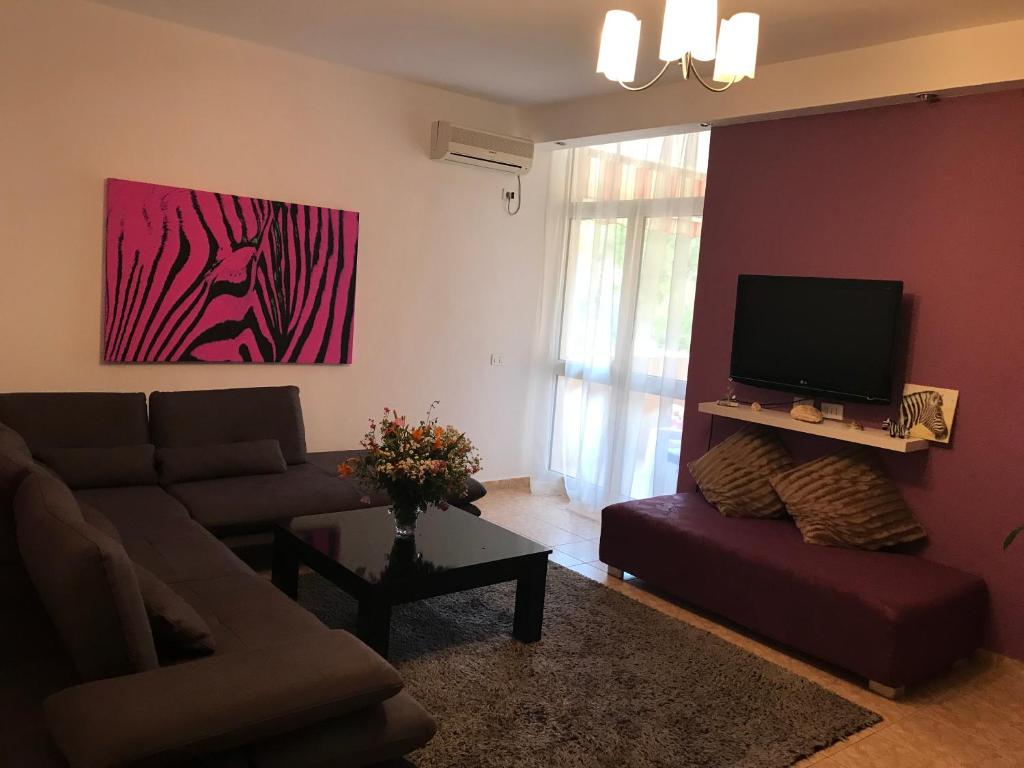 Ruang duduk di Fantasy Beach Apartment
