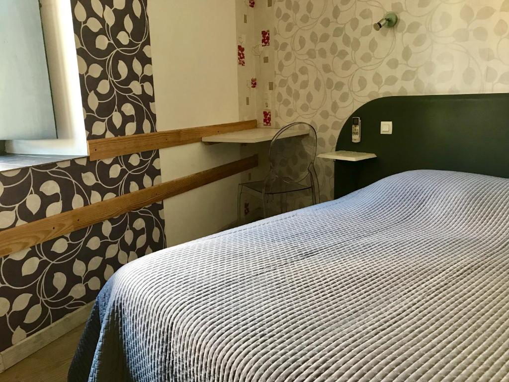 Postel nebo postele na pokoji v ubytování La Rapière
