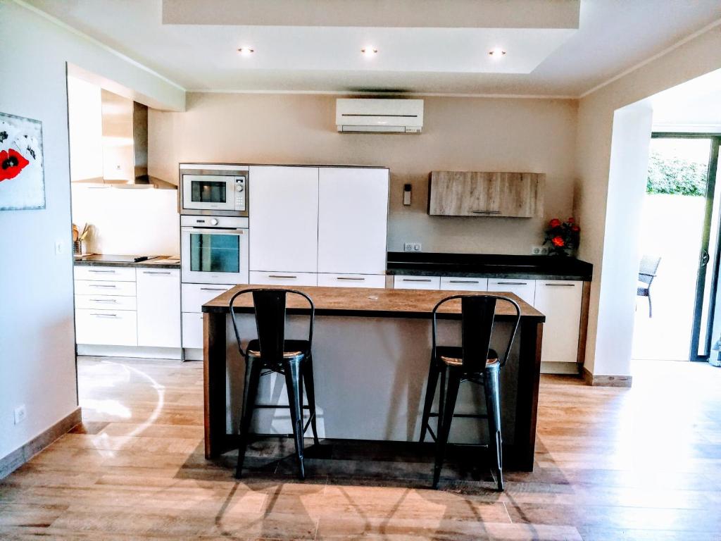 Kuchyň nebo kuchyňský kout v ubytování U San Daniellu villas et chambres