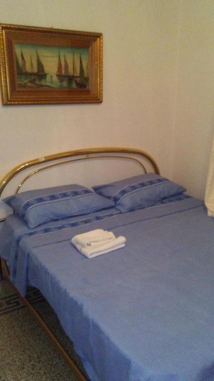 Łóżko lub łóżka w pokoju w obiekcie Hospalita