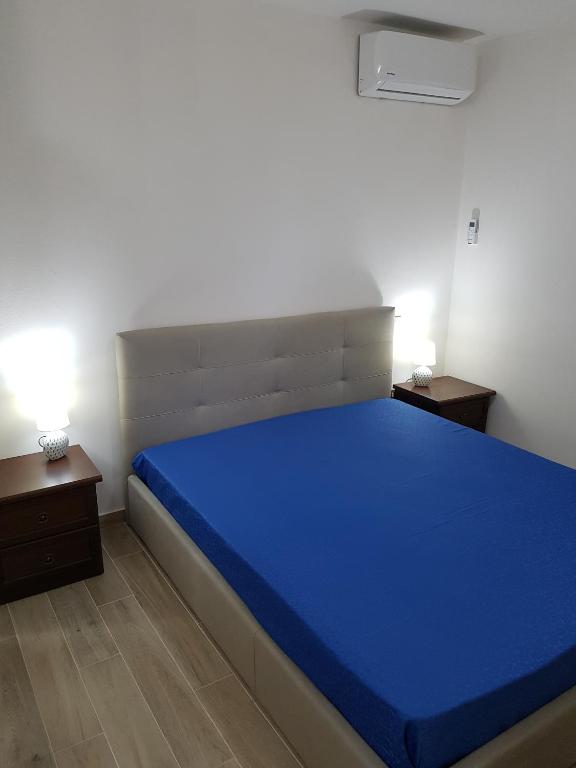 Postel nebo postele na pokoji v ubytování Residenza Francesca