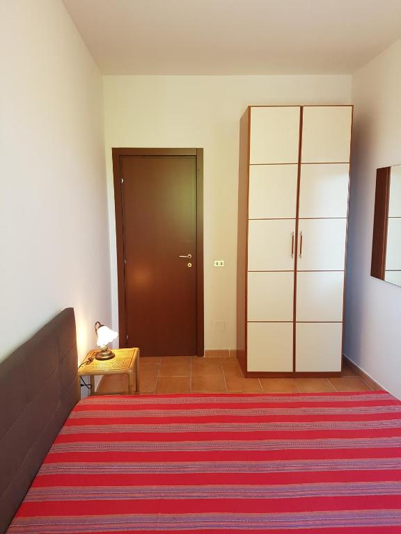 Postel nebo postele na pokoji v ubytování Residenza Francesca