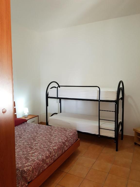 Postel nebo postele na pokoji v ubytování Residenza Francesca