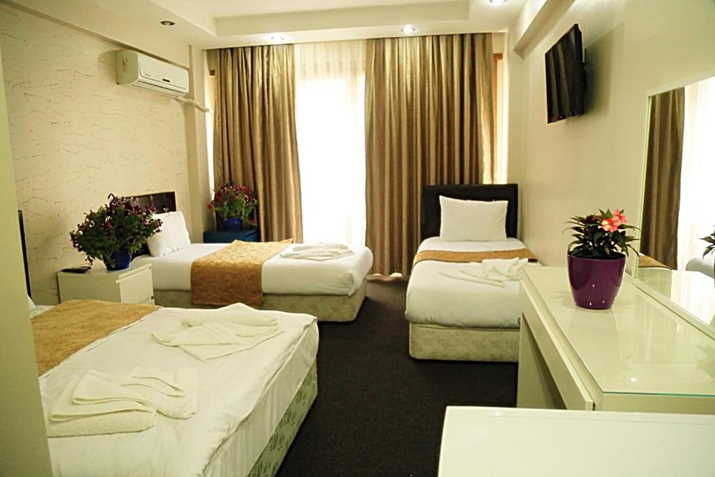 Postel nebo postele na pokoji v ubytování holiday family apart